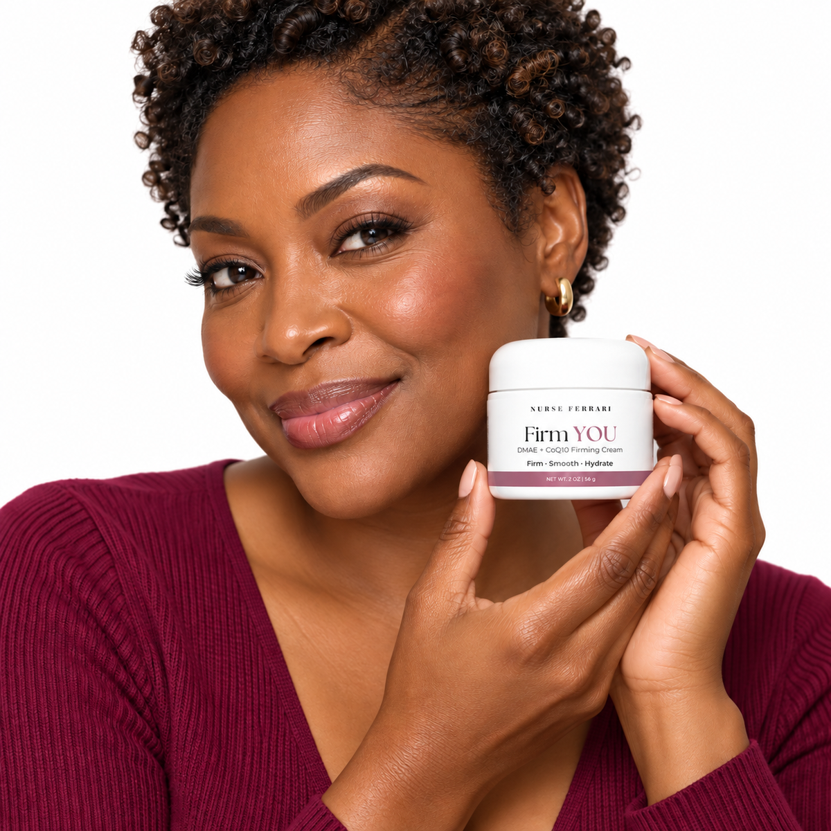Woman holding Firm YOU cream on white