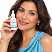 Original Radiant YOU model holding the Radiant YOU serum