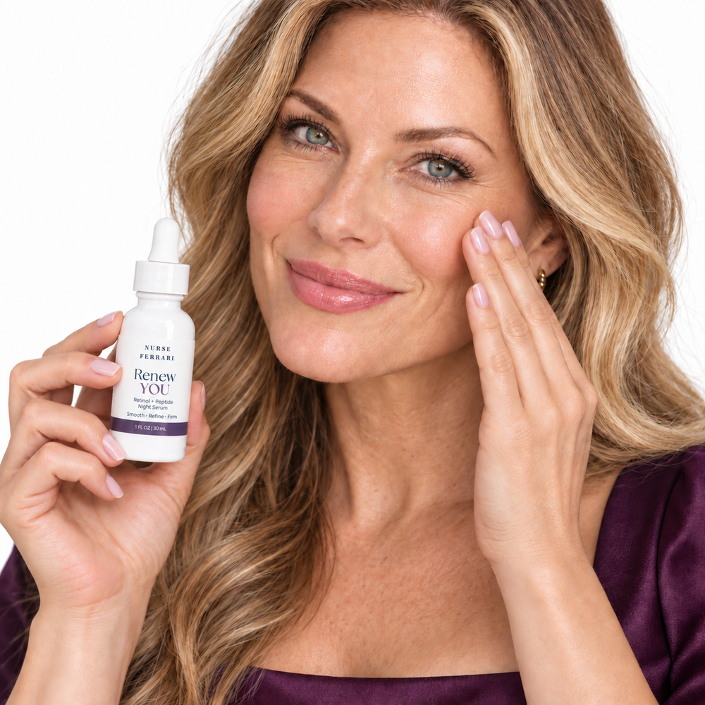 Woman gently pressing Renew YOU night serum into skin