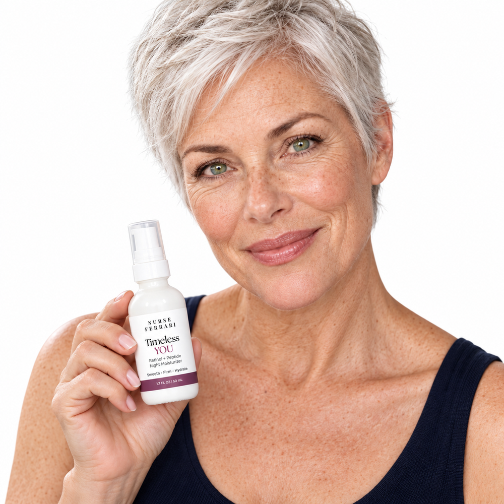 Silver-haired woman holding Timeless YOU night moisturizer on white