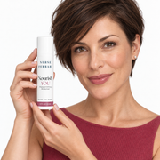 Woman in her 30s holding Nurse Ferrari Nourish YOU peptide moisturizer