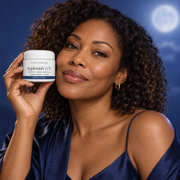 Black woman in her late 30s holding the exact Replenish YOU night cream jar